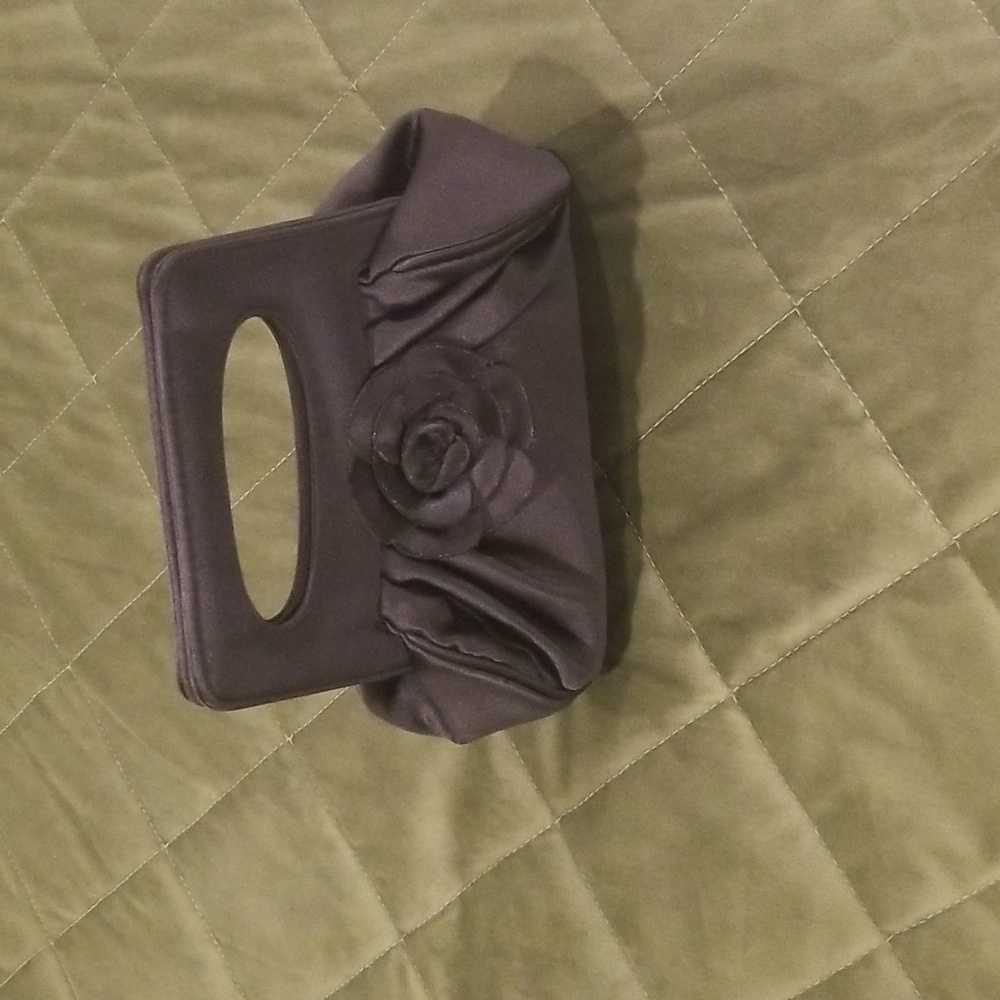 Formal black satin bag c/w magnet clip and satin flower at the front.